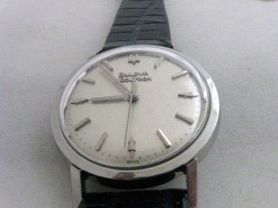 Vintage BULOVA Model 214 Accutron Sets on back of case  