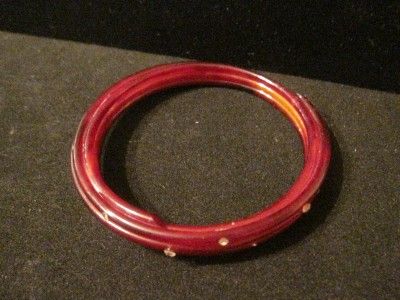 Vintage, Celluloid, cherry amber and rhinestone, coiled, bangle 