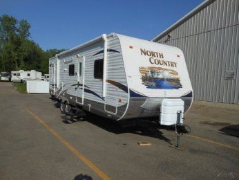 2011 NORTH COUNTRY 28BHSS SINGLE SLIDE TRAVEL TRAILER WITH BUNKS 