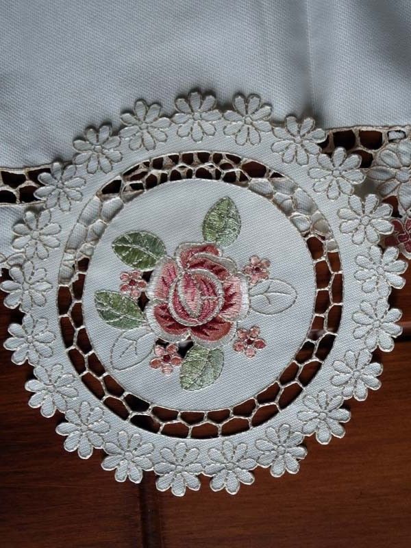 The detail and embellishments give this rose runner a designer look 