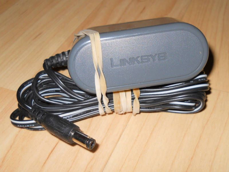 ORIGINAL LINKSYS AD12V/0.5A SW POWER SUPPLY (E)  