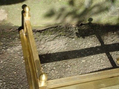   Arts & Grafts hand hammered brass fireplace fender in good condition